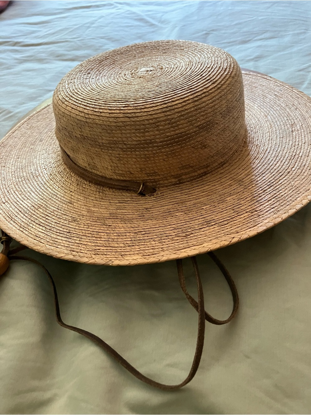 Straw hat with chin strap and 3.5” brim 21” band